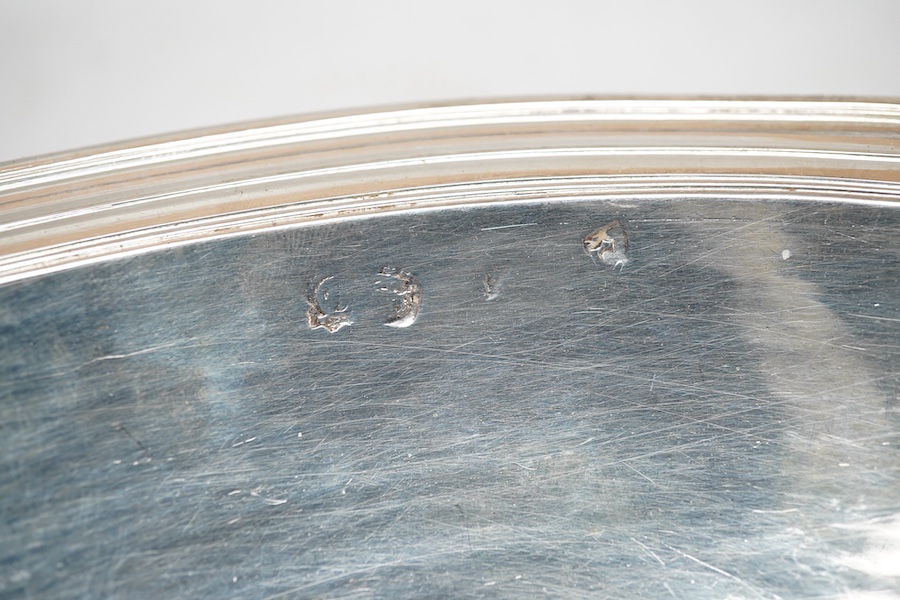 A rare late Charles II silver circular deep plate, makers mark 'D' (Jackson's reference P.139)